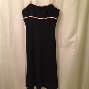 Black dress with beige straps and detail